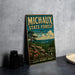A vintage-style metal sign for the Michaux State Forest in Pennsylvania, featuring a scenic landscape with pine trees, mountains, and a river.