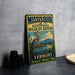 A vintage-style metal sign for the Missisquoi National Wildlife Refuge in Vermont, featuring an illustration of a heron and a serene landscape.
