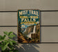 A vintage-style metal sign for the Mist Trail to Vernal and Nevada Falls in Yosemite National Park, California.
