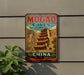 a vintage-style sign for the Mogao Caves in China, with a temple depicted in the background.