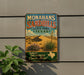 A vintage-style metal sign for Monahans Sandhills State Park in Texas, featuring a desert landscape with a cactus and a palm tree.