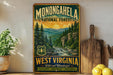 a vintage-style sign for Monongahela National Forest, with a scenic mountain landscape and a river. The sign is displayed on a wooden shelf, surrounded by various kitchen items such as a cutting board, a knife, a bowl, and a potted plant.