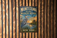 A vintage-style metal sign for the Montezuma National Wildlife Refuge in New York, featuring an illustration of a heron and a sunset over a lake.