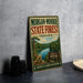 A vintage-style metal sign for Morgan-Monroe State Forest, Indiana, featuring a scenic landscape with a river and trees.