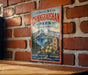 A vintage-style metal sign with the text "Mount Changbashi Park - China" and "Nature, Adventure, Discovery" is displayed on a brick wall.