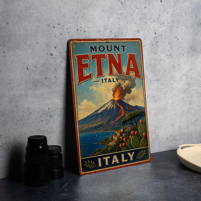 A vintage-style poster advertising Mount Etna, Italy, featuring a scenic landscape with a volcano and a coastal town.