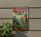 A vintage metal sign with the text "Mount Wuyi" and "China" displayed on it, featuring a scenic mountain landscape with a temple in the background.