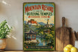 A vintage-style poster advertising the Mountain Resort and its Outlying Temples in Chengde, China, featuring traditional Chinese architecture and a serene landscape.