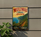 A vintage trail sign for Muliwa Trail in Hawaii, featuring a scenic mountain landscape with a wooden path leading to the ocean.