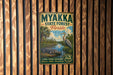 A vintage-style metal sign for the Myakka State Forest in Florida, featuring an illustration of a bird and a crocodile, mounted on a wooden wall.