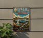 A vintage travel poster advertising Iceland, featuring a scenic landscape with a hot spring, mountains, and waterfalls.