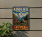A vintage-style sign for the Nanda Devi Biosphere Reserve in Western Himalaya, India, featuring a mountain landscape with a goat and pink flowers.