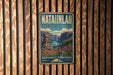 A vintage-style metal sign for "NATAINLAI TERRITORIAL PARK" is displayed on a wooden wall.
