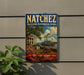 A vintage-style sign for Natchez National Historical Park, featuring a painting of a house, a river, and a steamboat, with the text "Mississippi" and "Preserving Our Heritage Sharing Our History" prominently displayed.