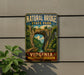 A vintage-style metal sign for Natural Bridge State Park in Virginia, featuring a scenic image of the bridge surrounded by lush greenery.