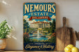 A vintage-style sign for Nemours Estate in Delaware, featuring a large illustration of a grand mansion surrounded by gardens and a fountain.