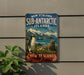 A vintage-style sign advertising the Sub-Antarctic Islands in New Zealand, featuring a penguin and a seal in a scenic landscape.