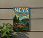 A vintage-style metal sign for Neys Provincial Park, Ontario, featuring a scenic landscape with pine trees, a lake, and mountains.