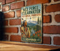 A vintage-style metal sign with a Native American figure and the text "NEZ PERCE-CLEARWATER NATIONAL FORESTS IDAHO" is displayed on a brick wall.
