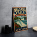 A vintage-style sign for Niagara Falls, the National Heritage Area in New York, featuring a scenic illustration of the falls and surrounding landscape.
