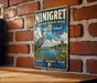 A vintage-style sign for the National Wildlife Refuge in Rhode Island, featuring a blue background with a bird illustration and text promoting wildlife protection, preservation, and enjoyment.
