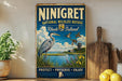 a vintage-style sign for the National Wildlife Refuge in Rhode Island, with a blue background and a bird illustration. The sign also includes the words "PROTECT - PRESERVE - ENJOY" and a lighthouse in the background.