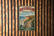 A vintage-style metal sign for Northumberland Provincial Park, featuring a scenic coastal path and the text "PRINCE EDWARD ISLAND" and "NATURAL BEAUTY ADVENTURE".