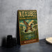 A vintage-style metal sign for the Noxbee National Wildlife Refuge in Mississippi, featuring an illustration of a bird in flight over a pond surrounded by trees.