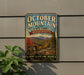 a vintage metal sign for October Mountain State Forest in Massachusetts, with a scenic mountain landscape and a sign indicating a hiking trail.