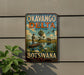a vintage-style sign for Okavango Delta System Botswana, depicting a man in a boat on a river surrounded by wildlife.