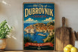 A vintage-style metal sign displaying the text "Old City of Dubrovnik, Croatia" and an illustration of the city's coastal town, with a banner that reads "The Pearl of the Adriatic".