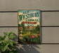 a vintage-style sign for Old Westbury Gardens in New York, with a large illustration of a well-manicured garden and a building in the background.