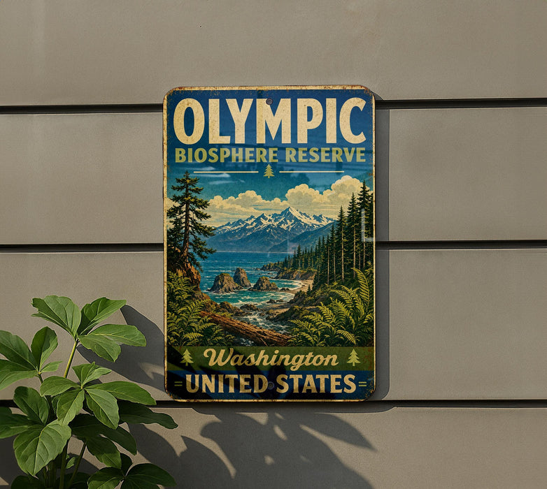 A vintage-style sign for the Olympic Biosphere Reserve in Washington, United States, featuring a scenic landscape with mountains, pine trees, and a body of water.