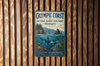 a vintage-style metal sign for the Olympic Coast National Marine Sanctuary in Washington, with a scenic illustration of marine life and a mountainous landscape.