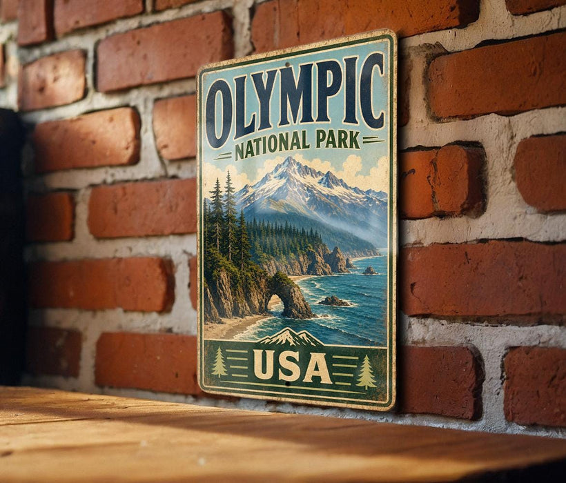 A vintage-style metal sign for Olympic National Park in the United States, featuring a scenic mountain landscape with pine trees and a body of water.