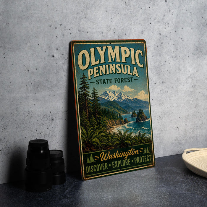 A vintage-style metal sign for Olympic Peninsula State Forest, featuring a scenic landscape with mountains, pine trees, and a body of water.