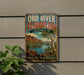 A vintage-style metal sign with the text "ORD RIVER FLOODPLAIN AUSTRALIA" and a scenic image of a river surrounded by mountains and vegetation.