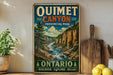 a vintage-style sign for Ontario, Canada, advertising the Quetet Canyon, a picturesque natural landmark.