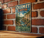 A vintage-style sign for Ontario, Canada, displaying the name "Oumet Canyon" and the words " Ontario" and "DISCOVER | EXPLORE | RELAX" in a rustic, vintage-inspired design.