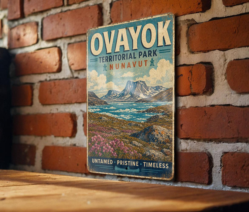 a vintage-style sign for Oayoyok, a famous hiking trail in Nunavut, Canada.