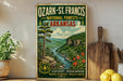 A vintage-style metal sign for Ozark-St. Francis National Forests in Arkansas, featuring a scenic landscape with a river, pine trees, and mountains.