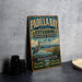 A vintage-style metal sign for Padilla Bay National Estuarine Research Reserve, featuring a bird and a scenic landscape.