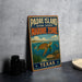 A vintage-style metal sign for Padre Island National Seashore Marine Zone, featuring an illustration of marine life and the text "Padre Island National Seashore Marine Zone" in a decorative font.