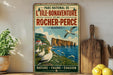 A vintage-style metal sign advertising the "L'Ile-Bonaventure et-du Rocher-Perce" in Quebec, featuring illustrations of birds, cliffs, and a body of water.