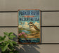 A vintage metal sign for the Parker River National Wildlife Refuge in Massachusetts, featuring a bird and a scenic landscape.