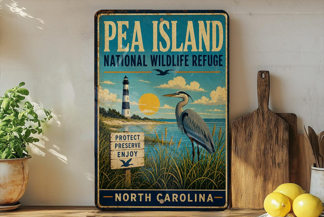 A vintage-style metal sign for Pea Island National Wildlife Refuge in North Carolina, featuring a lighthouse, a crane, and a sign that says "Protect Preserve Enjoy".