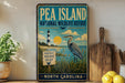 A vintage-style metal sign for Pea Island National Wildlife Refuge in North Carolina, featuring a lighthouse, a crane, and a sign that says "Protect Preserve Enjoy".