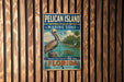 A vintage-style metal sign for the Pelican Island National Wildlife Refuge in Florida, featuring a pelican and a marine zone illustration.