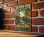 A vintage-style metal sign for the Peshtigo River State Forest in Wisconsin, featuring a scenic illustration of a river surrounded by pine trees.