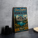 A vintage-style metal sign for Peter Lougheed Provincial Park in Alberta, Canada, featuring a scenic mountain landscape with a lake and pine trees.